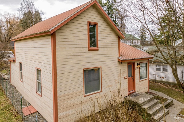 exterior space featuring metal roof