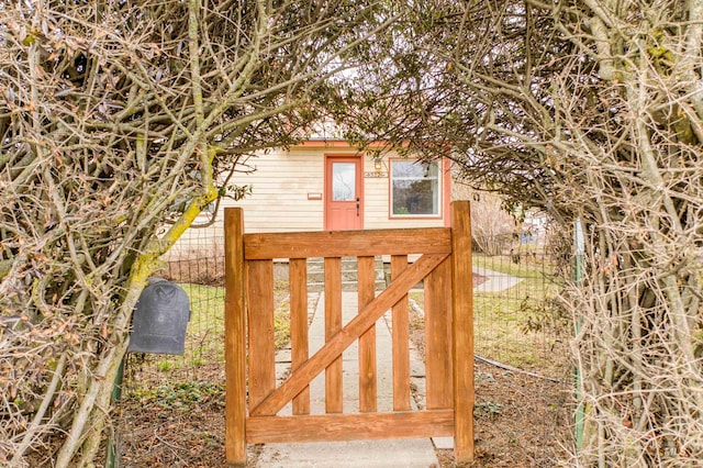 view of gate featuring fence