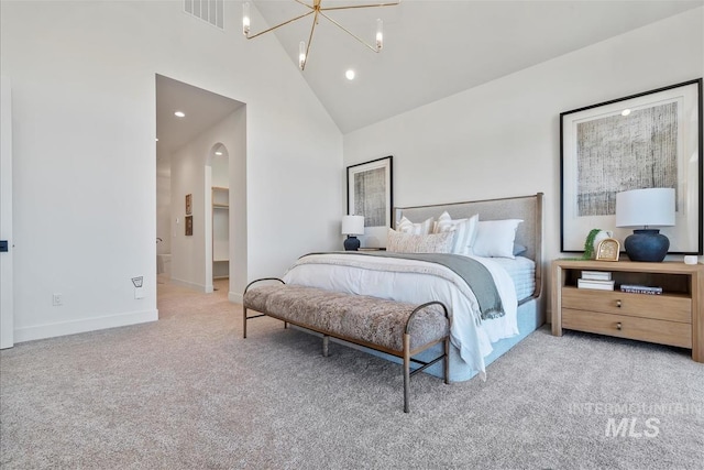 938 S Waning Ln, Eagle, ID 83616 - carpeted bedroom with high vaulted ceiling, arched walkways, baseboards, recessed lighting, and a chandelier