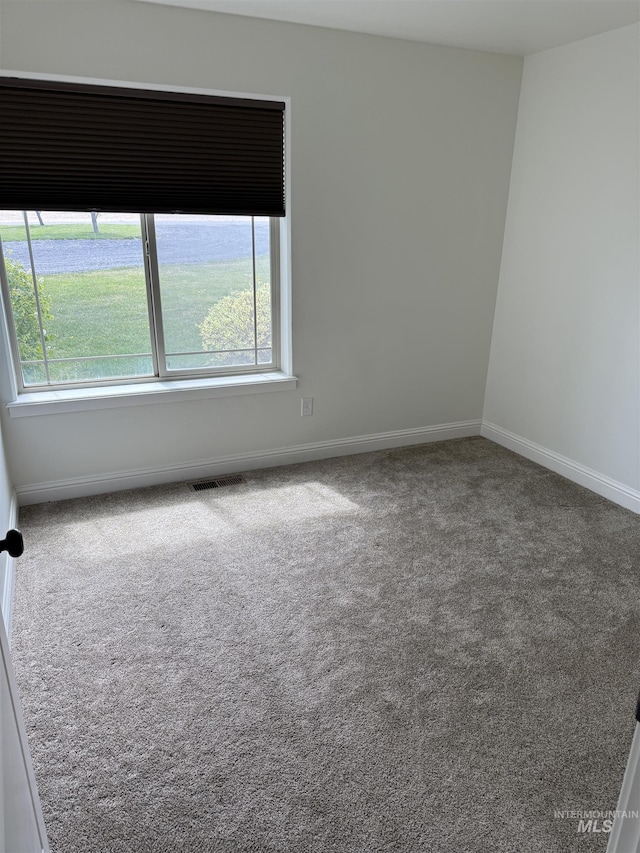 2486 E 3745, Twin Falls, ID 83301 - empty room with carpet floors, baseboards, and visible vents