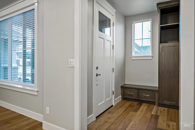 mudroom with light hardwood / wood-style flooring