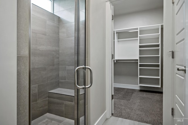 bathroom featuring an enclosed shower