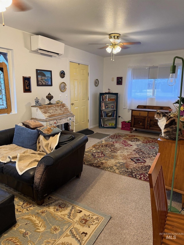 living room featuring a wall unit AC, ceiling fan, and carpet