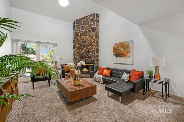 300 Morrison Unit 643, Twin Falls, ID 83301 - living room with carpet, a stone fireplace, high vaulted ceiling, and baseboards