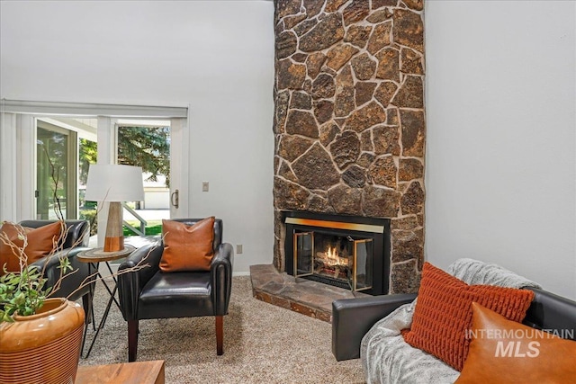 300 Morrison Unit 643, Twin Falls, ID 83301 - carpeted living area with a stone fireplace