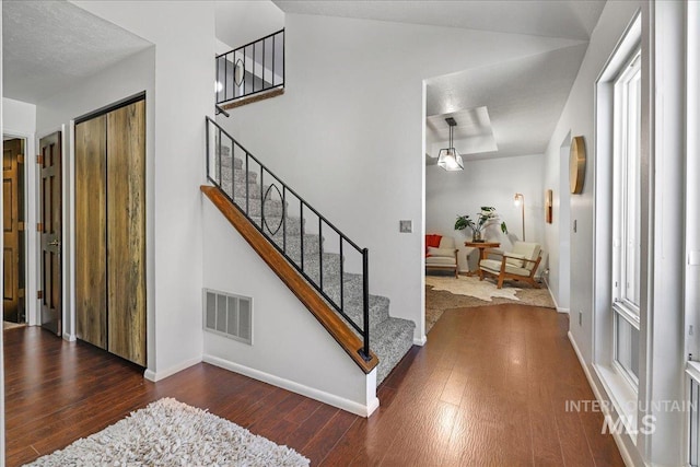 300 Morrison Unit 643, Twin Falls, ID 83301 - entryway featuring hardwood / wood-style flooring, stairs, and baseboards