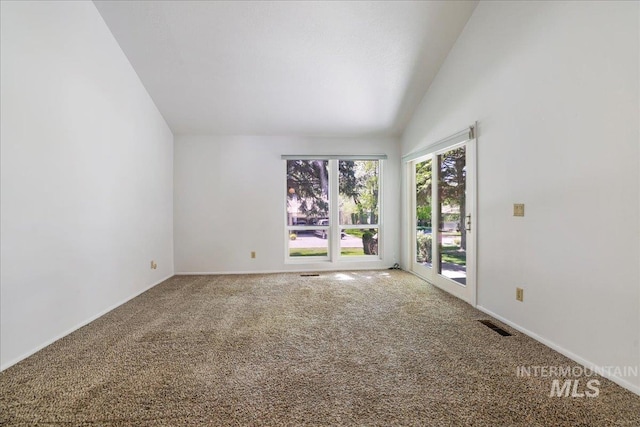 300 Morrison Unit 643, Twin Falls, ID 83301 - empty room featuring carpet floors, vaulted ceiling, and baseboards