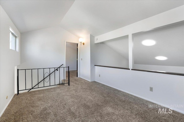 300 Morrison Unit 643, Twin Falls, ID 83301 - empty room featuring vaulted ceiling, carpet flooring, and baseboards