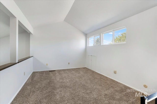 300 Morrison Unit 643, Twin Falls, ID 83301 - carpeted spare room with lofted ceiling and baseboards