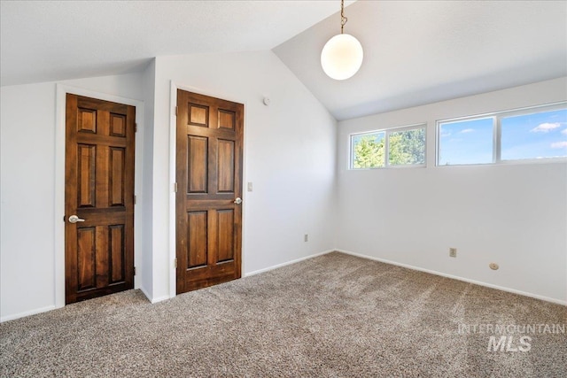 300 Morrison Unit 643, Twin Falls, ID 83301 - unfurnished bedroom with lofted ceiling, carpet flooring, and baseboards