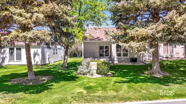 300 Morrison Unit 643, Twin Falls, ID 83301 - rear view of property featuring a lawn and central air condition unit