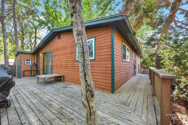 deck featuring central AC unit