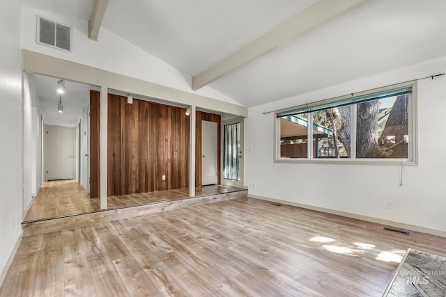 unfurnished room with light wood-style floors and baseboards