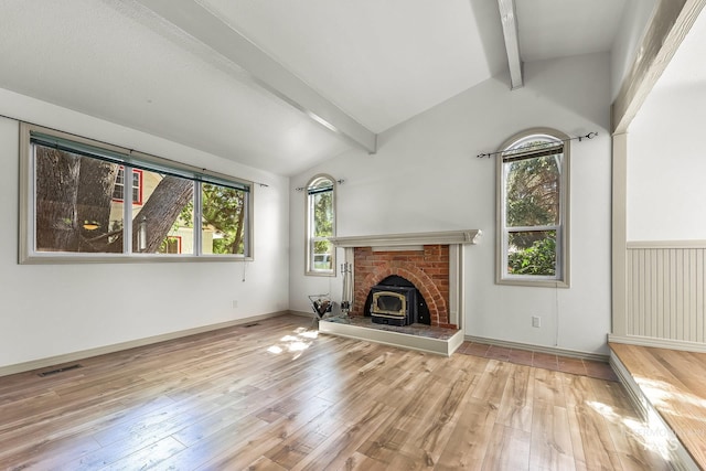 unfurnished living room featuring hardwood / wood-style floors and a fireplace