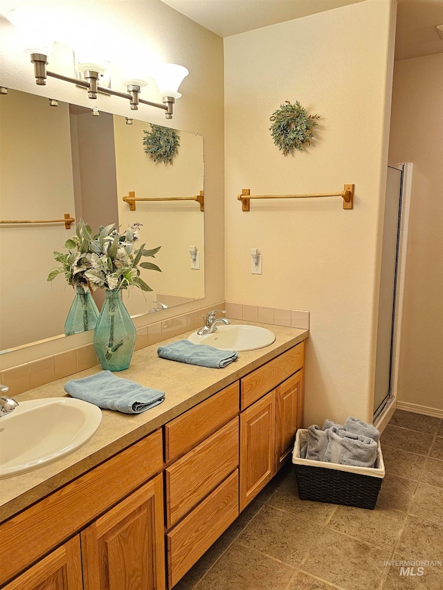 bathroom featuring vanity and walk in shower