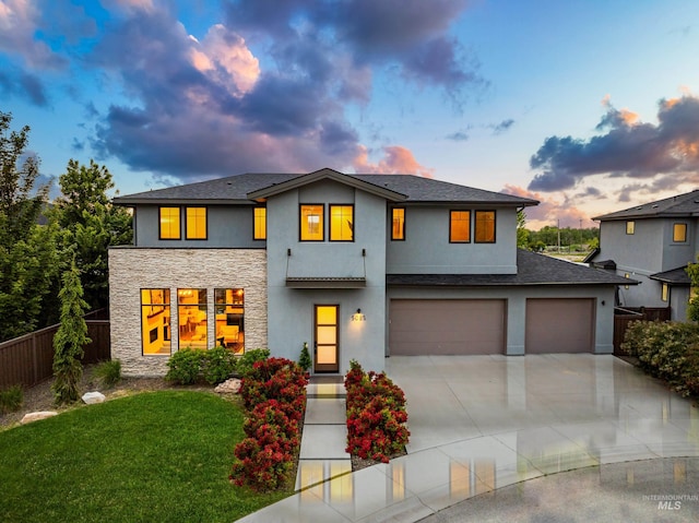 5085 S Taboo Pl, Boise, ID 83716 - view of front of home featuring stone siding, driveway, stucco siding, an attached garage, and a shingled roof