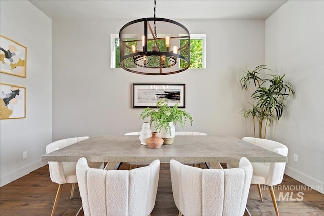 5085 S Taboo Pl, Boise, ID 83716 - dining area featuring a chandelier, baseboards, and dark wood-style floors