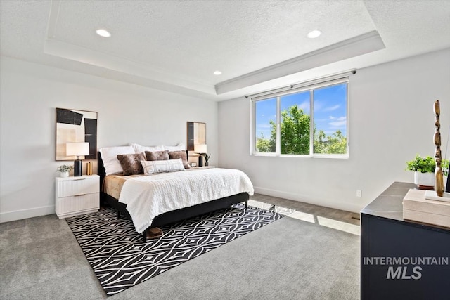 5085 S Taboo Pl, Boise, ID 83716 - carpeted bedroom featuring a raised ceiling, baseboards, recessed lighting, and a textured ceiling