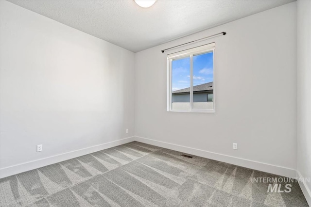 5085 S Taboo Pl, Boise, ID 83716 - carpeted spare room with baseboards and a textured ceiling