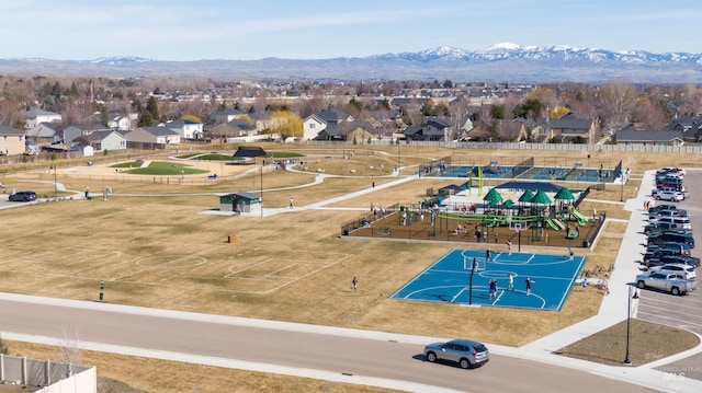 bird's eye view featuring a mountain view and a residential view