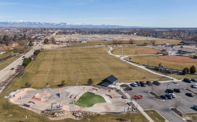 bird's eye view featuring a rural view and a mountain view