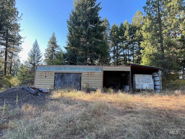 view of outdoor structure featuring a carport