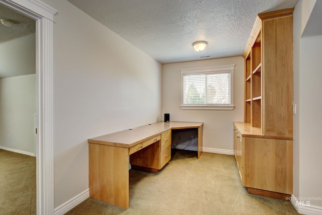 2853 N High Desert Way, Meridian, ID 83646 - unfurnished office with light colored carpet, a textured ceiling, and baseboards