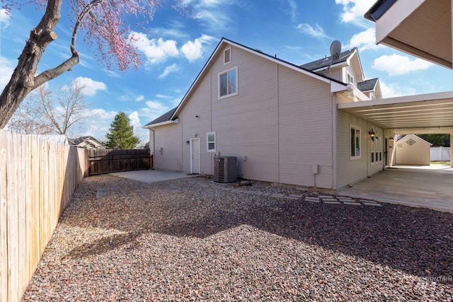 2853 N High Desert Way, Meridian, ID 83646 - back of property featuring central air condition unit and a fenced backyard