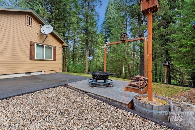 view of patio featuring a wooden deck