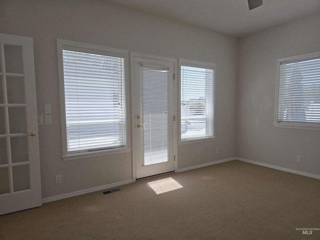 1203 Tara Ct, Fruitland, ID 83619 - spare room with carpet floors, baseboards, visible vents, and ceiling fan