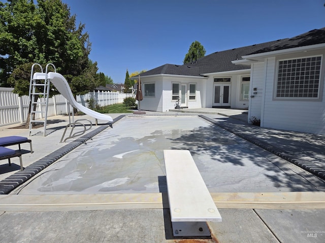 1203 Tara Ct, Fruitland, ID 83619 - view of patio / terrace featuring fence and french doors