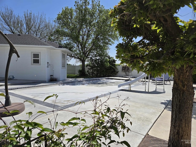 1203 Tara Ct, Fruitland, ID 83619 - view of swimming pool with a patio and fence