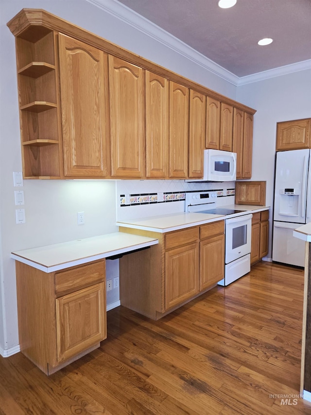1203 Tara Ct, Fruitland, ID 83619 - kitchen with ornamental molding, dark wood-style floors, white appliances, and light countertops