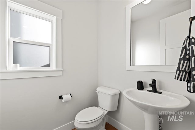 bathroom with toilet and sink