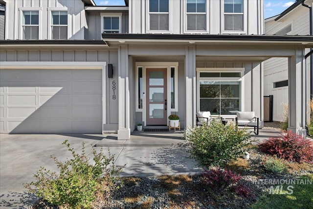 doorway to property featuring a garage