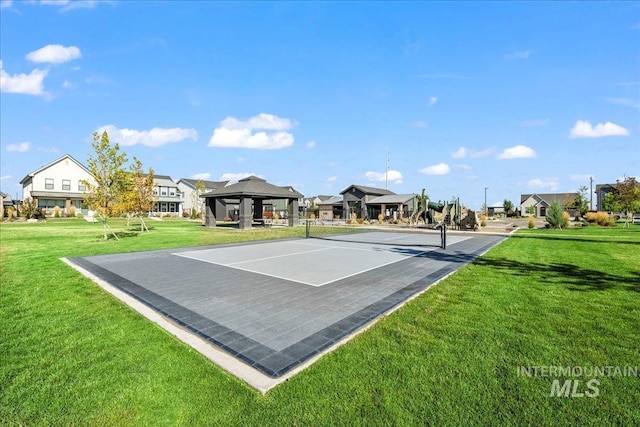 view of sport court with a gazebo, a lawn, and tennis court