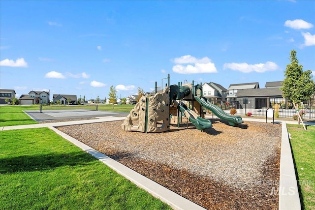 view of jungle gym with a yard