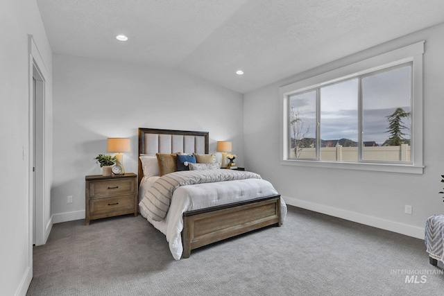 carpeted bedroom featuring recessed lighting, a textured ceiling, lofted ceiling, and baseboards