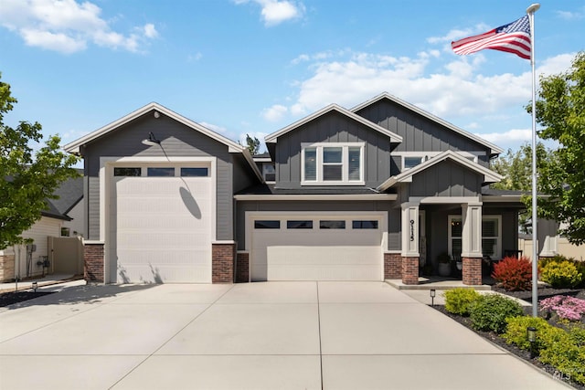 9115 S Palena Ave, Kuna, ID 83634 - craftsman-style house with board and batten siding, brick siding, concrete driveway, and an attached garage