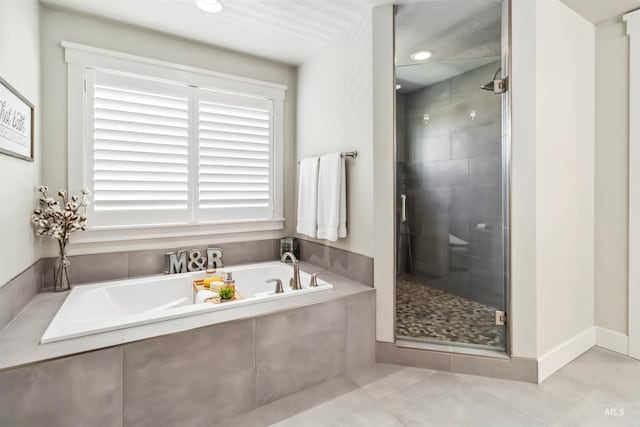 9115 S Palena Ave, Kuna, ID 83634 - bathroom featuring a garden tub, a shower stall, tile patterned flooring, and recessed lighting