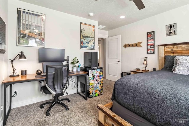 9115 S Palena Ave, Kuna, ID 83634 - bedroom featuring carpet, a textured ceiling, a desk, and a ceiling fan