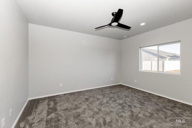 spare room featuring a ceiling fan, baseboards, carpet flooring, and recessed lighting