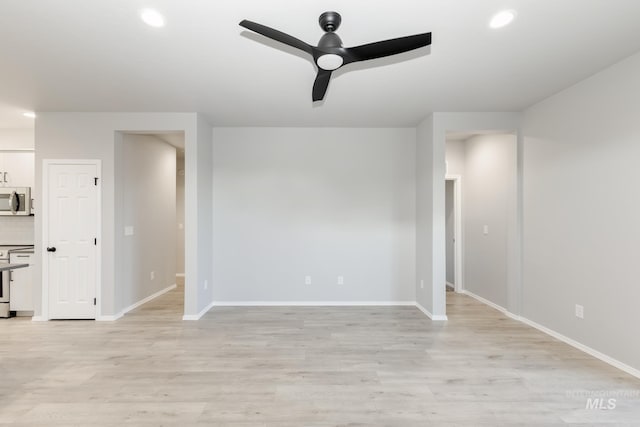 unfurnished room featuring light wood-style floors, a ceiling fan, and recessed lighting