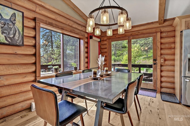 10 Daggett Rim, Boise, ID 83716 - dining room featuring a chandelier, rustic walls, light wood finished floors, and lofted ceiling