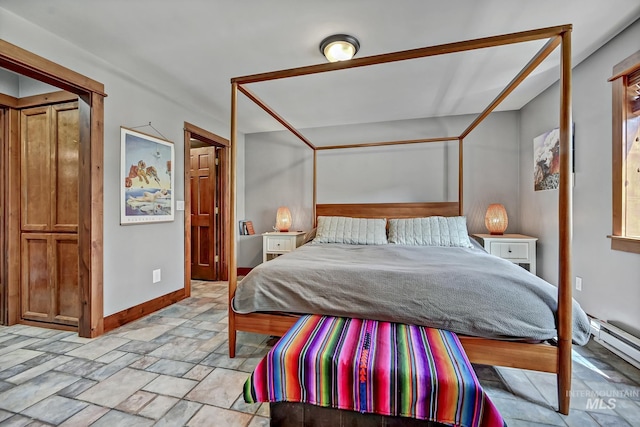 10 Daggett Rim, Boise, ID 83716 - bedroom featuring light stone finish flooring, baseboards, and a baseboard radiator