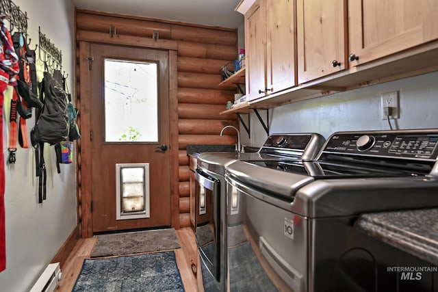 10 Daggett Rim, Boise, ID 83716 - washroom featuring rustic walls, cabinet space, separate washer and dryer, light wood-style flooring, and a baseboard radiator