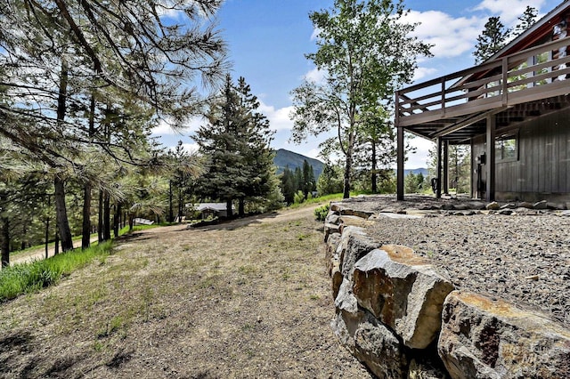 10 Daggett Rim, Boise, ID 83716 - view of yard featuring a deck with mountain view