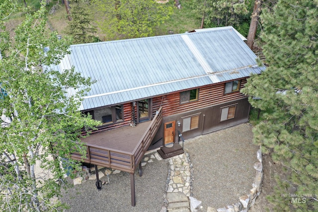 10 Daggett Rim, Boise, ID 83716 - back of property with log exterior and metal roof
