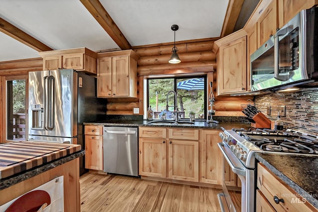 10 Daggett Rim, Boise, ID 83716 - kitchen featuring appliances with stainless steel finishes, light brown cabinetry, a sink, light wood finished floors, and rustic walls