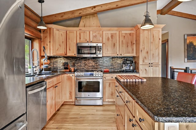 10 Daggett Rim, Boise, ID 83716 - kitchen with stainless steel appliances, light brown cabinets, light wood-type flooring, backsplash, and a sink